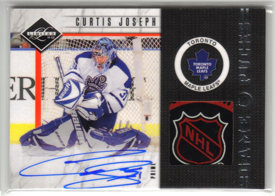 Curtis Joseph #31 Autographed Large Logo Toronto Maple Leafs NHL Puck